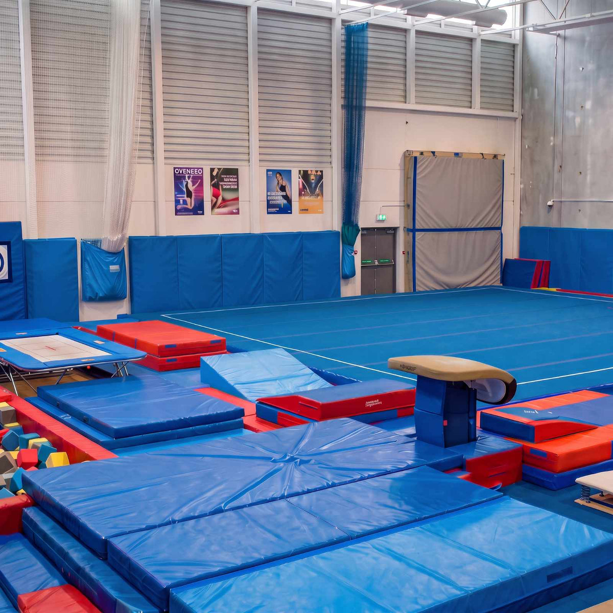 Gym wall and floor padding made with 18.5 oz inflatable bounce house vinyl